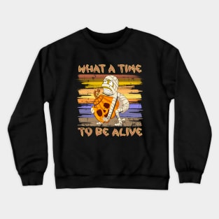 What A Time To Be Alive Halloween Funny Mummy Carrying a Pumpkin Crewneck Sweatshirt